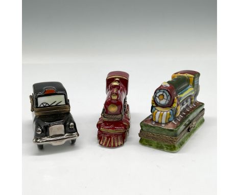Porcelain hinged boxes includes black taxicab 2.75"L, red steam engine train with gilt accents 3"L and multicolored train 2.7