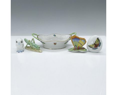 This well-crafted grouping includes a double-handled small dish with a floral motif and green handles, a whimsical green gras