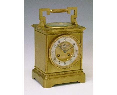 Late 19th/early 20th Century brass cased carriage style mantel clock, the dial with silvered chapter ring having Arabic numer