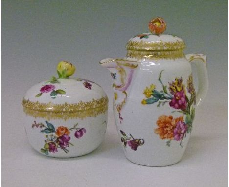 19th Century Berlin porcelain lidded jug decorated with painted foliate sprays, 12.5cm high together with a matching sugar ba