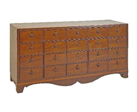 19th Century mahogany nest of twenty drawers, each having a turned wooden handle, standing on bracket feet, 79.5cm wide  Cond