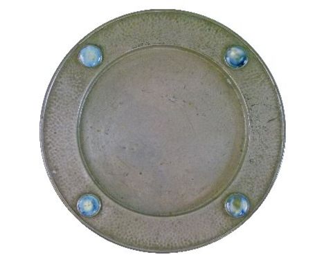 Early 20th Century Civic Pewter bread dish, the hammered border inset with four Ruskin style circular panels, 27cm diameter  