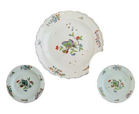 Pair of Meissen Kakiemon plates, each decorated with a butterfly amongst foliage on a white ground, the borders with foliate 