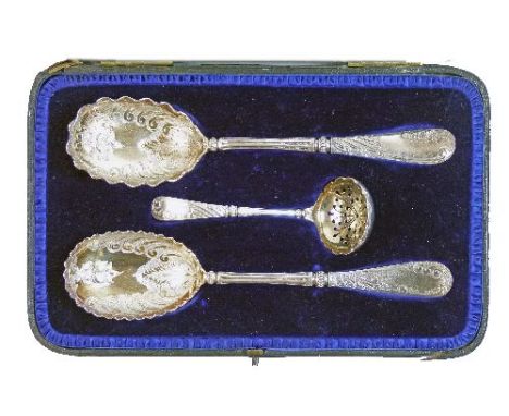 Set of three Victorian silver fruit servers comprising: a pair of spoons, each bowl with embossed decoration together with a 