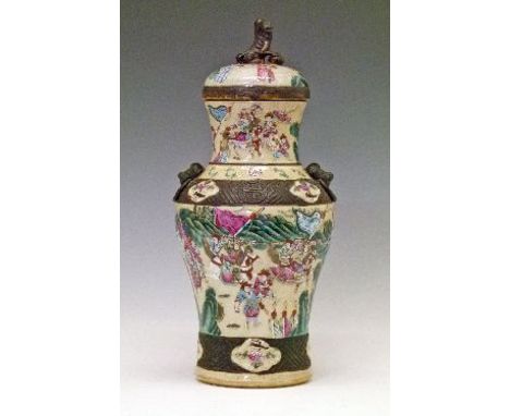 19th Century Famille Rose crackle glazed vase and cover, having polychrome enamelled decoration depicting battle scenes betwe