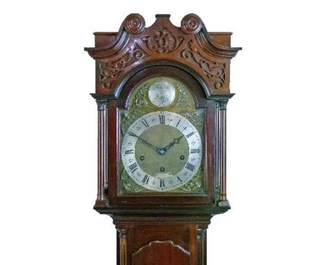 20th Century Chippendale style mahogany cased grandmother clock, the hood with scroll pediment with blind fret panel below, a