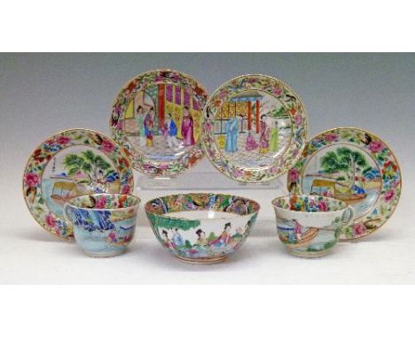 Two Cantonese Famille Rose tea cups and saucers, each piece decorated with figures in a boat and calligraphic script, diamete