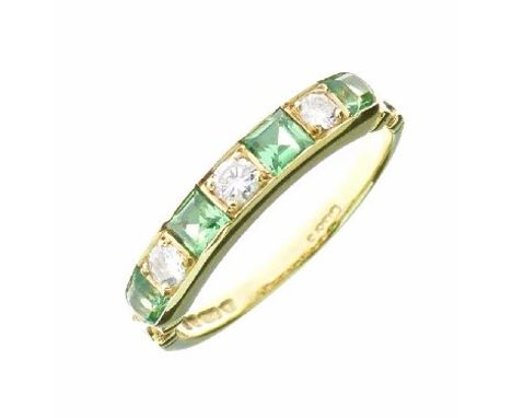 Diamond and Tsavorite seven stone 18ct gold ring, the three brilliant cuts alternate set, totalling approximately 0.24 carats