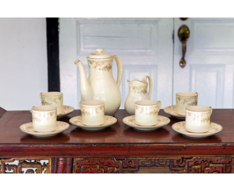 A ROYAL DOULTON 'DIANA' PART COFFEE SERVICE
Printed with flowers and fruit, comprising; a coffee pot and cover, milk jug, six