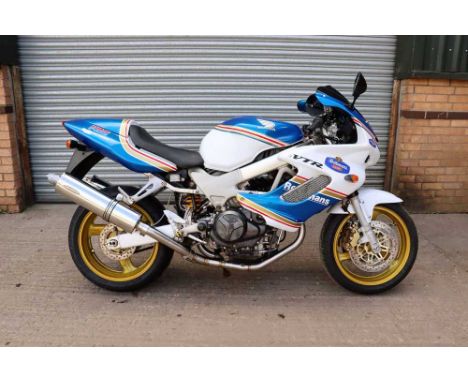 Registration No: R221 ERT Frame No: JH2SC36A0W1Y102179 MOT: NoneGood quality Rothmans Racing replica paint schemeNew Delkevic