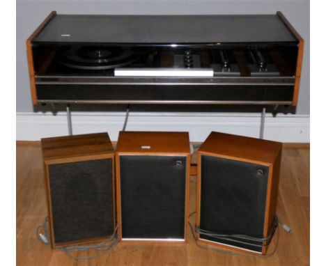 A Decca Sound Compact 3 entertainment system, with turntable and radio, teak cabinet on metal legs, together with a pair of D