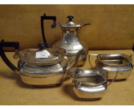 An Edwardian silver four piece tea and coffee service, Birmingham 1906, of faceted baluster form, with compressed teapot, the