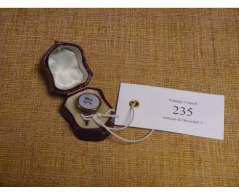 A late 19th century seal signet ring, the sardonyx plaque engraved with the initial "R", on scroll engraved shoulders, unmark