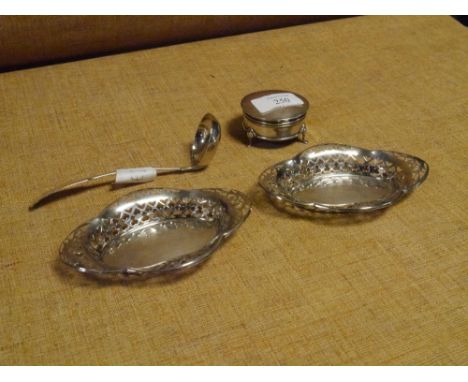 A group of silver comprising: a pair of Edward VIII bon bon dishes, Chester 1936, each oval with pierced sides; an Edwardian 