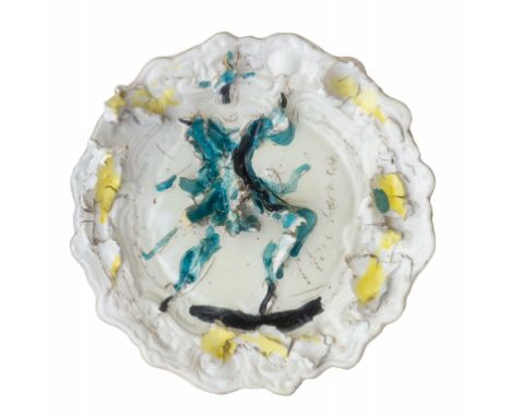 LUCIO FONTANA (1899-1968) Maschera 1951ceramica colorata: giallo  verde e nero su fondo bianco Ø cm 40 firmato sul fronteaute