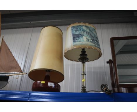 A brass table lamp and shade; a pottery table lamp and shade