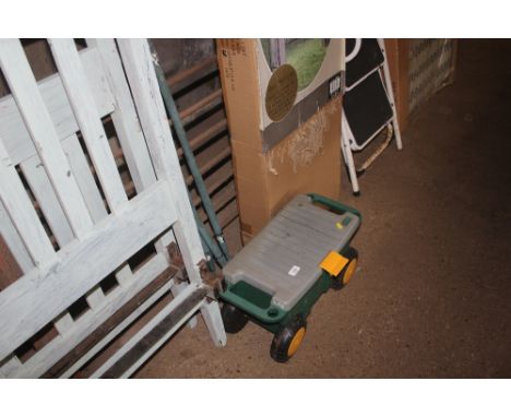 A quantity of long handled gardening tools and a gardeners tool box