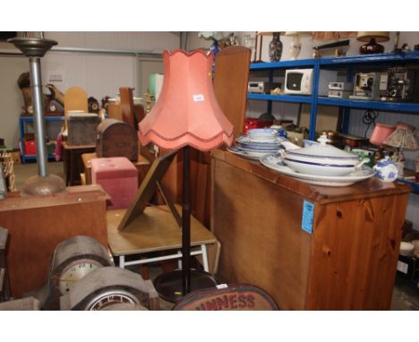 A standard lamp and shade