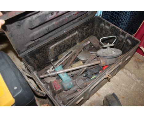 A metal box and contents of various tools