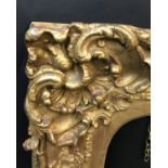 19th Century English School. A Gilt Composition Frame, with Swept Centres and Corners, Arched, 32" x