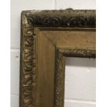19th Century English School. A Watts Style Gilt Composition Frame, 74.5" x 50.5" (rebate).