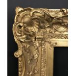 19th Century English School. A Gilt Composition Swept Centres and Corners Frame, 30" x 22" (