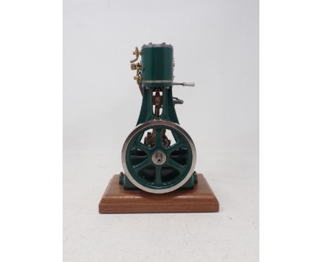 A Stuart Turner No.4 Vertical Engine Model on wooden plinth, finished to a high standard 8 1/2in H overall 