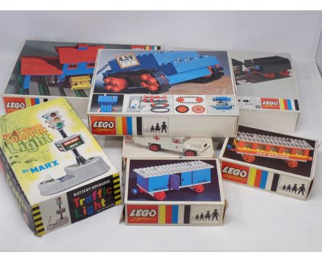Twenty four assorted boxed Lego Sets and a Marx battery operated Traffic Light 