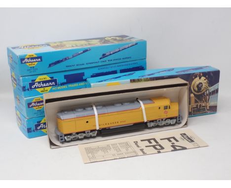 Four Athearn HO scale American Locomotive Kits (one unbuilt) and a complete Dummy Kit, boxed 