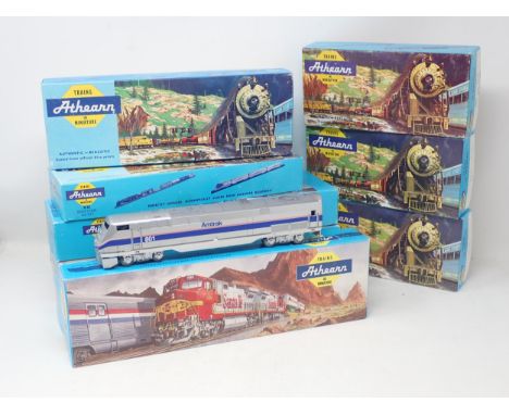 Eleven boxed Athearn HO scale American Locomotives and five Wagons, etc. 