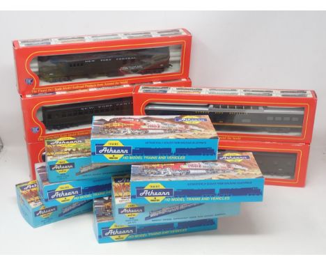 Five boxed IHC HO scale Coaches and seven boxed Athearn Wagons 