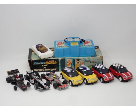 A Corgi Electro Rockets Car and Autocharger, four Scalextric Minis and three Racing Cars A/F 