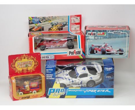 A boxed Polistil Ferrari 312 T2 F.1, a  boxed Polistil Ferrari 312 T5, a boxed Corgi 2031 Muppet Show and a boxed Ripmax 1:20