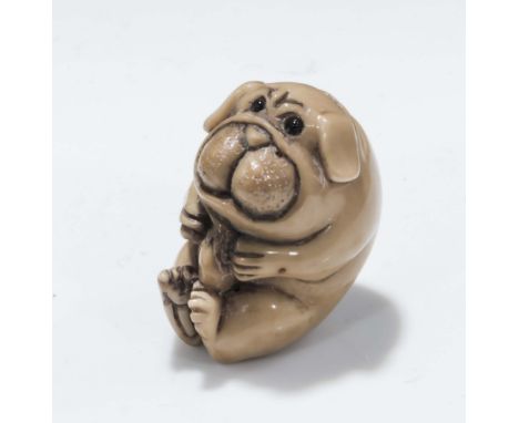 Tagua nut style netsuke of a dog 