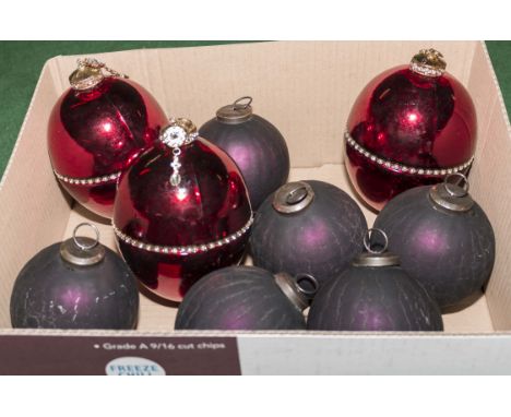 Three large ruby red quality Christmas baubles together with six smaller blue baubles