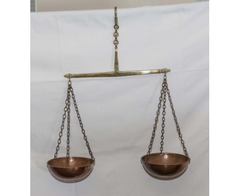 A pair of vintage copper and brass scales