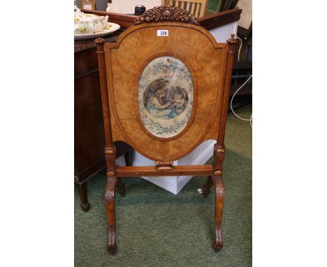 19thC French Walnut Adjustable Fire screen with original silk insert and carved surmounted floral decoration