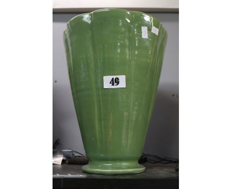 C H Brannam Pottery Flared vase of Green ground 