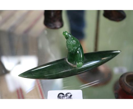 Nephrite Jade Inuit figure of a man in Canoe 