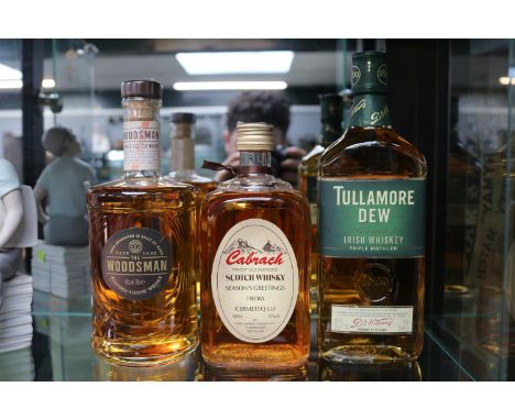 3 Whiskies to include The Woodsman blended Scotch Whisky 70cl, Cabrach 700ml &amp; Tullamore Dew Irish Whisky 700ml 