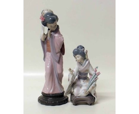 Two Lladro Geisha girl figures. Condition report: see terms and conditions