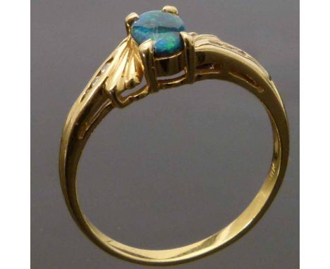 18ct gold ring set with an oval black opal on point diamond shoulders, ring size L+, gross weight 2.2g. Condition report: see