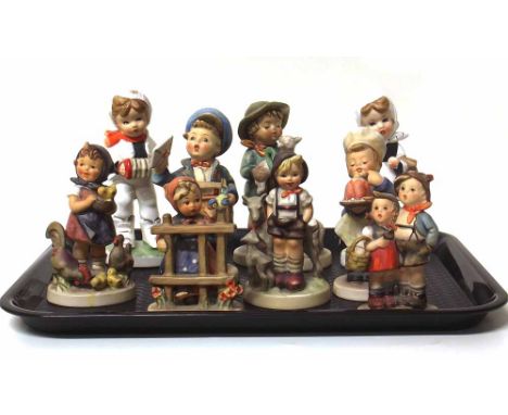 Seven Hummel figures and two others. Condition report: see terms and conditions