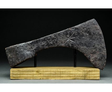 Ca. 900-1000 ADThis iron battle axe features a rounded socket and a long head, flaring towards the blade. Etched decoration o