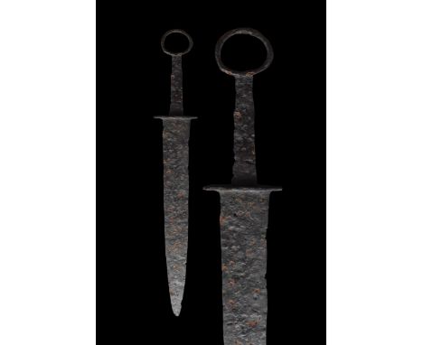 Ca. 200-300 ADA beautifully formed iron-short sword with a ring pommel, a tapering handle, a double-edged blade, and a pointe