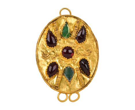 Ca. 300 BCA gold pendant plaque with granulated rim and applied opposing loops. The upper face intricately decorated with fil