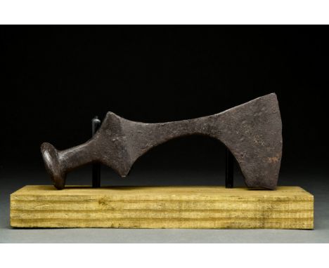 Ca. 900-1000 ADAn iron axe head with a curved blade, slim cheek, elliptical shaft-hole, and a hammer poll.Axes were commonly 