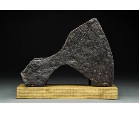 Ca. 900-1100 ADAn iron battle axe with a wide, fan-shaped blade, tapering cheek, heavy poll and lozenge-shaped socket.For mor