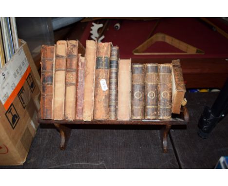 BOOK TROUGH CONTAINING A QUANTITY OF SMALL LEATHER BOUND AND OTHER VINTAGE VOLUMES