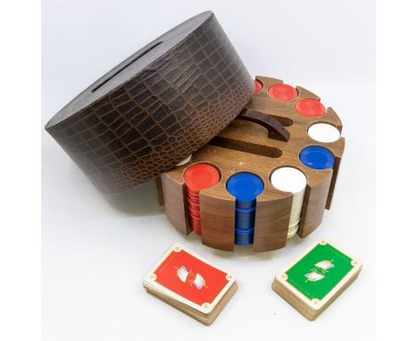 A vintage circa 1970s revolving wood Poker chip caddy, with central carrying handle and mock crocodile cover, with chips and 